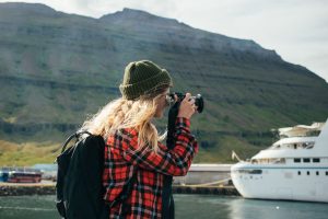 woman makes photos of epic cruise ship in fjord AZRAVC9